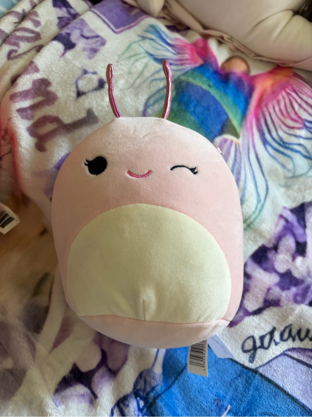 Pink snail Squishmallow